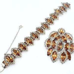Weiss  Brooch and bracelet  set champagne  crystal silver tone metal Designer signed Weiss NY  mid century Jewelry set