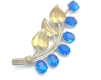 large blue floral  Brooch  crystal   Rhinestone gold over silver metal  1940s pin