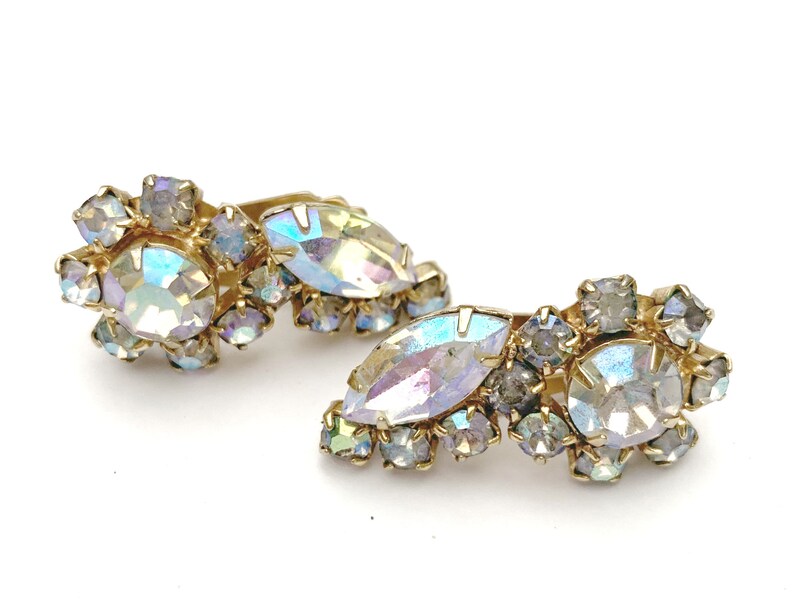 Rhinestone Climbing earrings gold plated metal Mid century Flower clear Aurora borealis crystal clip on earrings