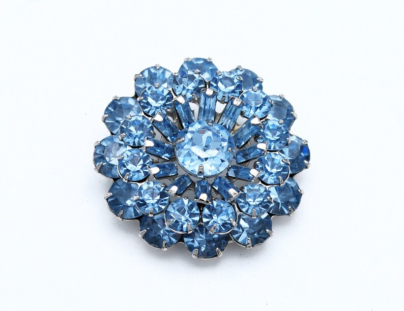 Weiss Rhinestone Brooch light blue Crystal stones silver setting round atomic Mid century pin