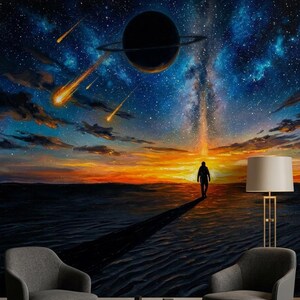 May include: A wall mural depicting a dark, rippled landscape under a vibrant sunset sky. A silhouette of a person walks toward the horizon. Above, a large ringed planet and bright yellow shooting stars glow against a deep blue, starry galaxy.