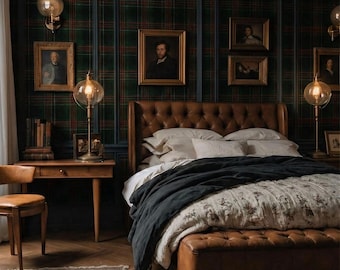 May include: A tufted brown leather bed frame with a matching tufted bench at the foot, dressed in white linens and a dark charcoal throw blanket. The bedroom features dark green plaid wallpaper, framed portraits, and brass globe lamps.