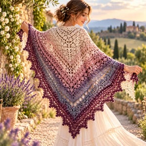 May include: A triangular crochet shawl featuring a gradient color pattern that transitions from cream at the top to light pink, dusty rose, lavender, and deep purple at the scalloped edge, showcasing an intricate openwork lace stitch design.