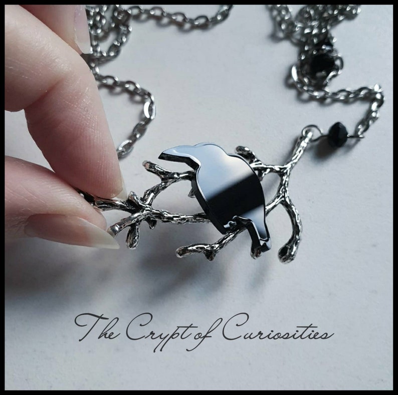 Gothic raven and tree branch crystal necklace. Etsy