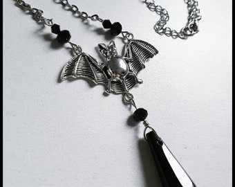 Elegant Gothic black glass crystal bat necklace.