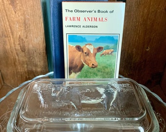 Vintage French Arcorac glass butter dish featuring a dairy cow on the lid. In perfect condition. It's a vintage classic!