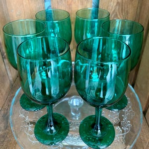 Vintage green wine glasses. Made in the 1970s, all in their original packaging & unused. 10 available, sold separately. In great condition!
