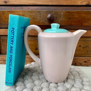 Vintage Poole Pottery Twintone Ice Green and Mushroom hot water pot. Made in England in the 1950s. In great condition.