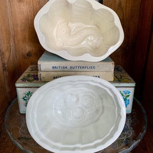 Antique ceramic jelly moulds. TWO available, sold separately. In lovely, vintage condition. Beautiful items for a country kitchen display.