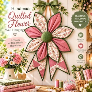 May include: A handmade quilted flower wall hanging featuring alternating pink solid and floral patterned fabric petals with a green centre, topped with a green fabric bow. The text reads Handmade Quilted Flower Wall Hanging, A Touch of Handmade Happiness, Beautiful Handmade Home Decor, Premium Fabric, Thoughtful Details, and Brightens Any Space.