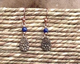 Teardrop shaped flower handmade bronze dangle earrings with denim blue natural stone. Floral design. Dainty! Boho style jewelry.