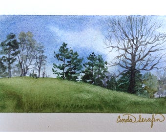 FRAMED ORIGINAL Miniature watercolor landscape, winter, spring. SFA. 8x10 mat and rustic frame. Rolling hills, cloudy sky. Cinda Serafin