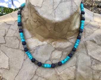 Genuine Hubei turquoise, black lava stone, and pirite men’s necklace. Rustic jewelry. Sterling silver details by Serafin. Adjustable length