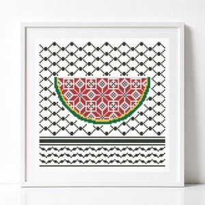 May include: A framed cross-stitch pattern featuring a stylized watermelon slice with a red, white, and green geometric design. The background consists of a black and white diamond grid pattern with a horizontal black and white border at the bottom.