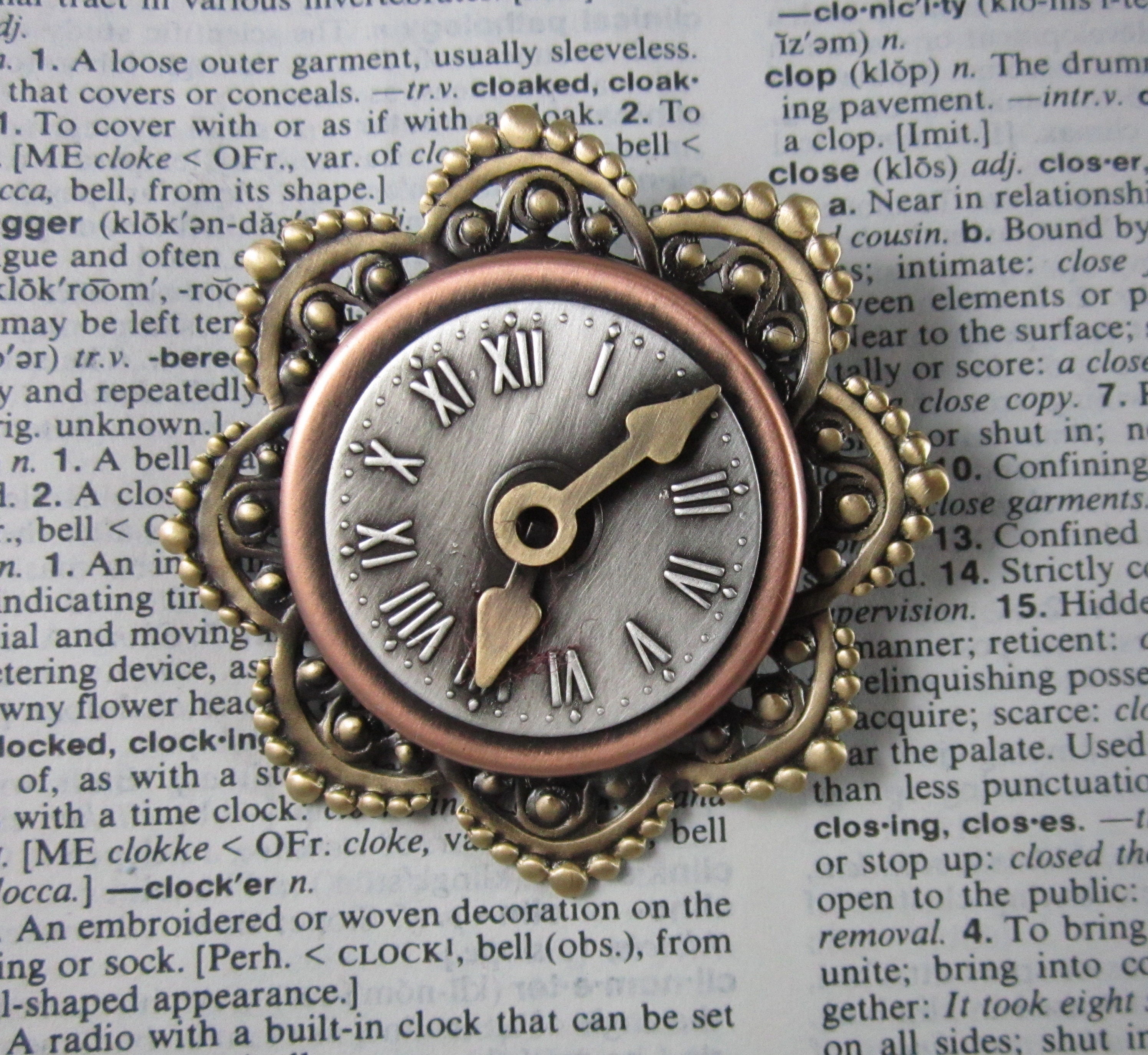 Clock brooch deals