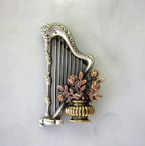 Harp brooch deals