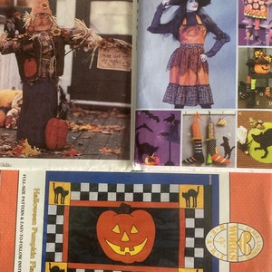 May include: Several McCall's Crafts patterns for Halloween decorations. One pattern features a scarecrow, another a witch costume, and a third a Halloween pumpkin flag with black cat accents.