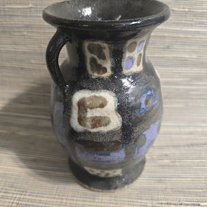 A patchwork vase. Hand made.