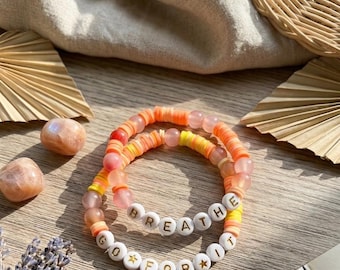 Braccialetti in argilla con perline a tema "Mentalità positiva"