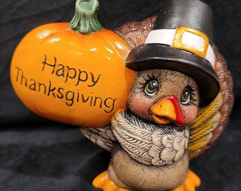 Feliz Día de Acción de Gracias. Pavo, calabaza, cerámica pintada a mano.