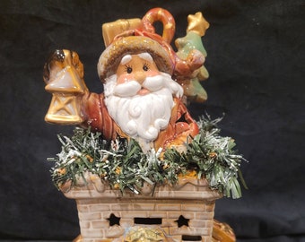 Santa Glazed coming out of your chimney.  Multi Media ceramics  Christmas Winter gifts Holiday season with click in light