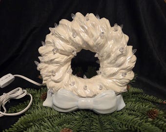 Ceramic Wreath Light Mother of Pearl with white lights and light blue bow