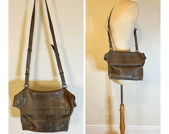 alexander wang framed skeletal leather backpack Pebbled Calfskin Prisma Black Rose Gold Hardware 1733961 5 zipper pockets Marti leather backpack