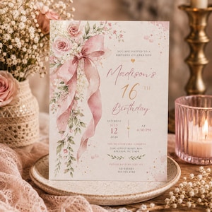 May include: A rectangular birthday invitation card featuring a watercolor illustration of pink roses, white flowers, and a large pink ribbon. The text reads: Madison's 16th Birthday, Saturday July 12 2026 at 6:30 PM, The Meadowlark Gardens, Raleigh, NC.