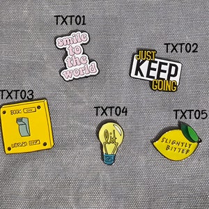 Enamel Needle Minder - Text theme - assorted sizes