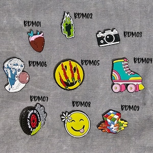Enamel Needle Minder - Random theme - assorted sizes
