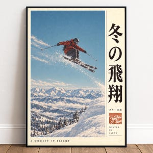 May include: A framed poster featuring a skier in a red jacket jumping over a snowy mountain range. The text reads "A MOMENT IN FLIGHT", "冬の飛翔", "スキーの旅", and "WINTER IN JAPAN". The design includes a small square image of mountains.