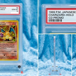Peut inclure: Une carte à collectionner Charizard Holo CD Promo japonaise de 1999 dans un étui de protection transparent PSA. L'étiquette indique 1999 P.M. JAPANESE CHARIZARD-HOLO CD PROMO #6 GEM MT 10. La carte présente une illustration holographique de Charizard.