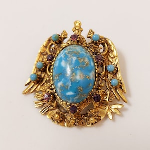 Vintage FLORENZA Faux Turquoise Cabochon Heraldic Goldtone Brooch image 1