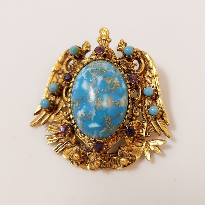 Vintage FLORENZA Faux Turquoise Cabochon Heraldic Goldtone Brooch image 1