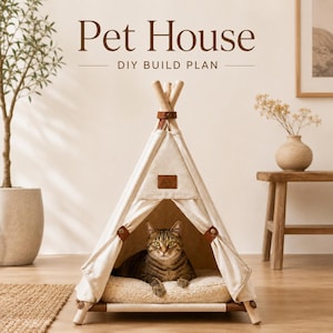 May include: A teepee-style pet house with a cream-colored fabric cover, wooden poles, and brown leather accents. A tabby cat rests on a plush, cream-colored cushion inside. The text Pet House DIY BUILD PLAN is displayed above the structure.