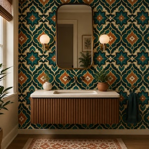 May include: A bathroom vanity with a fluted wooden cabinet and a white countertop, featuring a rectangular mirror, two globe wall sconces, and patterned wallpaper in teal, orange, and cream. A small white vase and a potted plant sit on the counter.