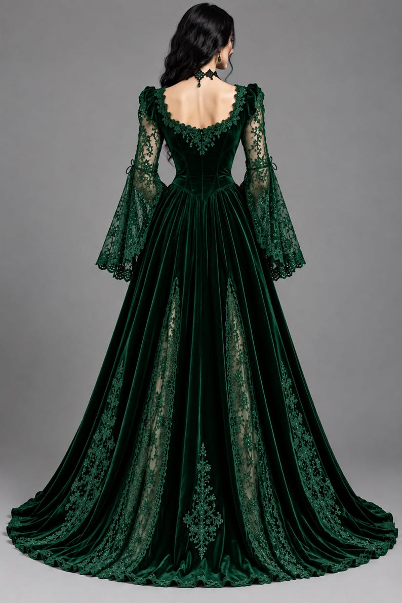 May include: A floor-length dark green velvet gown featuring long bell sleeves with intricate lace detailing, a square neckline, and a full skirt with lace-trimmed panels. The back of the dress displays a fitted bodice and a sweeping hemline.