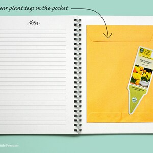 May include: A white notebook with a yellow envelope pocket on the right side. The text "store your plant tags in the pocket" is written at the top of the page. The text "Notes" is written at the top of the left page. A plant tag with a picture of yellow flowers is in the pocket.