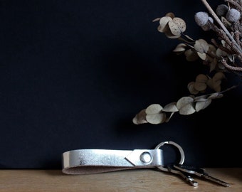 Short lanyard made of genuine leather silver metallic, small gift for women in a minimalist design