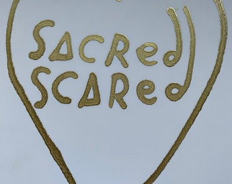 Sacred/Scared: shimmery simple symbol gold alcohol ink on yupo