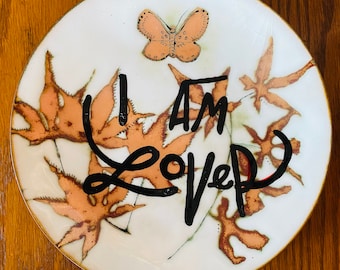 I Am Lover / black enamel on thrifted vintage metal artist plate