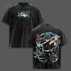 May include: A black acid-wash t-shirt featuring a graphic of an anime character's eyes on the front. The back displays a large illustration of a sword-wielding character surrounded by teal mist, Japanese text, and the words Mist Hashira.