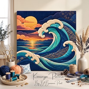 May include: A square wall art piece featuring a layered fabric-style depiction of a large ocean wave, a golden sun, and clouds. The text Kinusaiga Pattern By B4Banana Print is visible below. A metal ruler is placed near the bottom right.