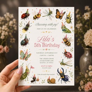 May include: A rectangular birthday invitation card featuring a border of watercolor insects wearing party hats, including ladybugs, bees, butterflies, and a snail. The text reads: Buzzing with joy! Lila's 5th Birthday, Saturday, September 21st, 2:00 PM - 5:00 PM, The Garden Room, 245 Blossom Lane, Austin, TX 78701, RSVP to Emma 512-555-2481, Come dressed for bug-sized fun!