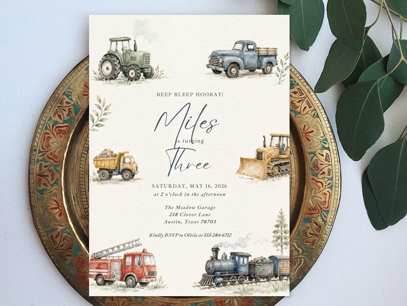 May include: A rectangular invitation card featuring watercolor illustrations of a green tractor, blue pickup truck, yellow dump truck, bulldozer, red fire truck, and a train. Text reads: BEEP BLEEP HOORAY! Miles is turning Three, SATURDAY, MAY 16, 2026.
