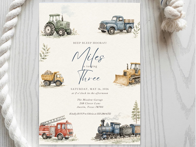 May include: A rectangular invitation card featuring watercolor illustrations of a green tractor, blue pickup truck, yellow dump truck, yellow bulldozer, red fire engine, and a blue steam train. Text reads: BEEP BLEEP HOORAY! Miles is turning Three.