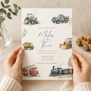 May include: A birthday invitation card featuring watercolor illustrations of a green tractor, blue pickup truck, yellow dump truck, yellow bulldozer, red fire engine, and a blue steam train. Text reads: BEEP BLEEP HOORAY! Miles is turning Three, SATURDAY, MAY 16, 2026 at 2 o'clock in the afternoon, The Meadow Garage, 218 Clover Lane, Austin, Texas 78703, Kindly RSVP to Olivia at 555-284-6712.