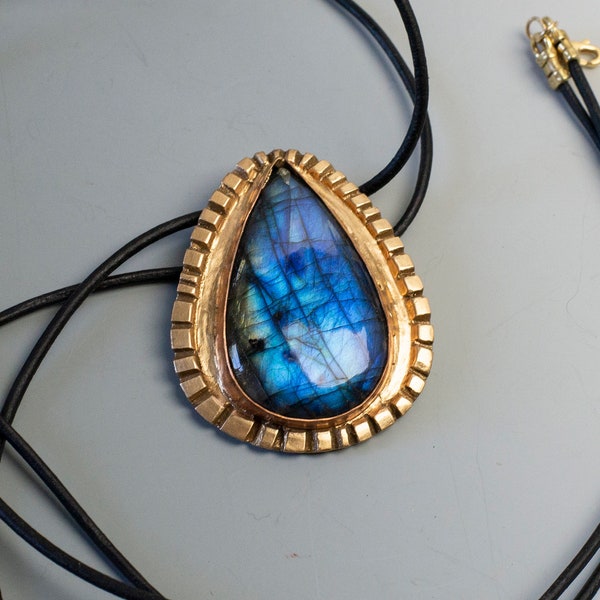 Bright Blue Labradorite Teardrop Pendant Set in Gold Bronze and Hung on Black Leather Cord