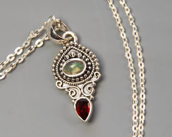 Delicate Garnet and Opal Pendant Set in Silver on Silver Chain