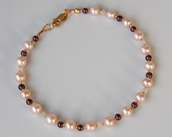 Natural Quality Pink Pearl Bracelet with Garnet and  White Topaz Accent Gems and 14K Gold Filled Clasp. 7 3/4 Inches